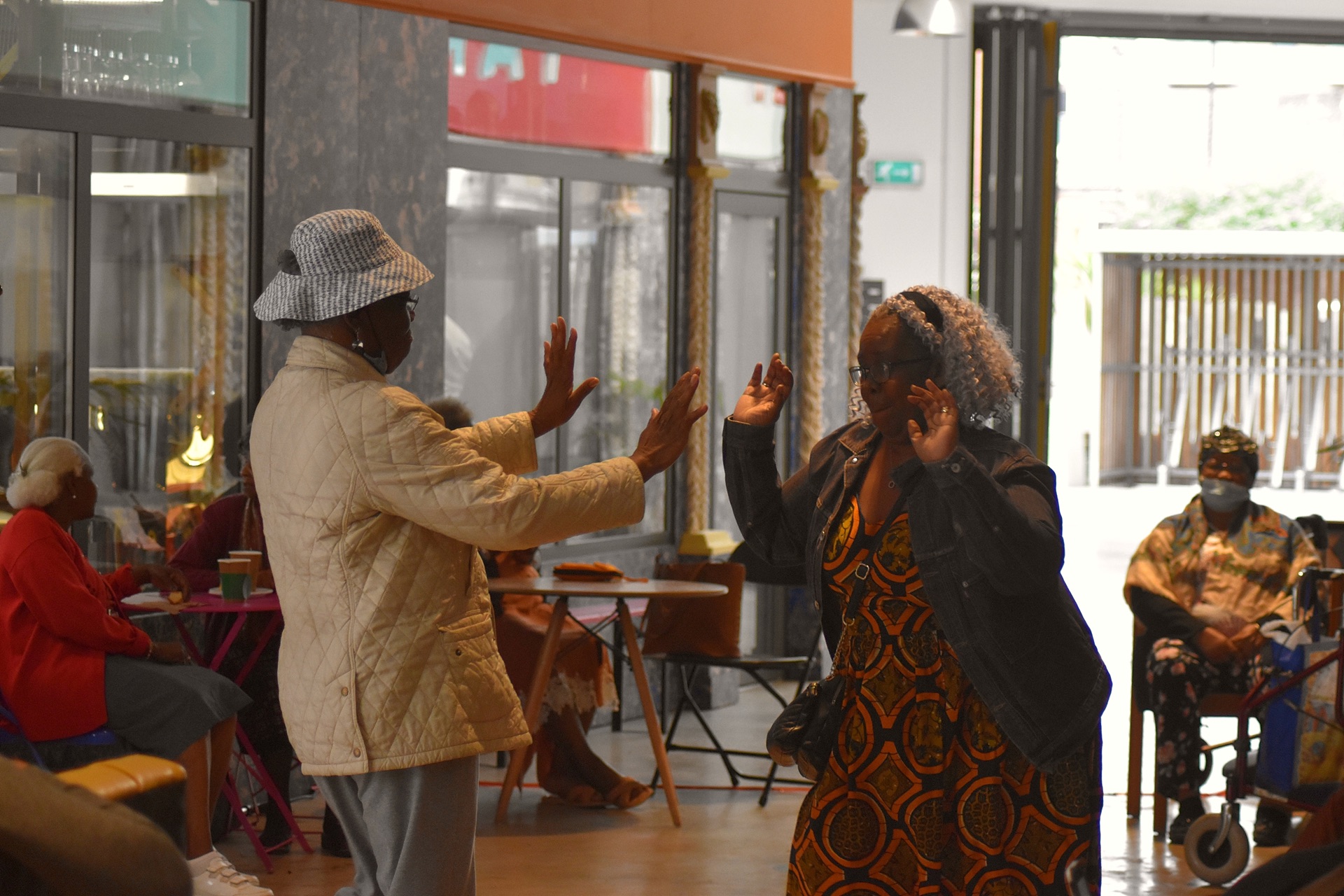 Two people dancing at the Message We Bring event