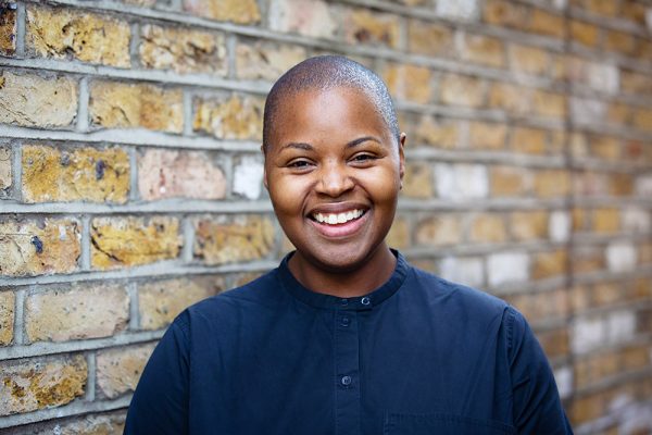 Artist Beverley Bennett wearing a blue top and looking at the camera