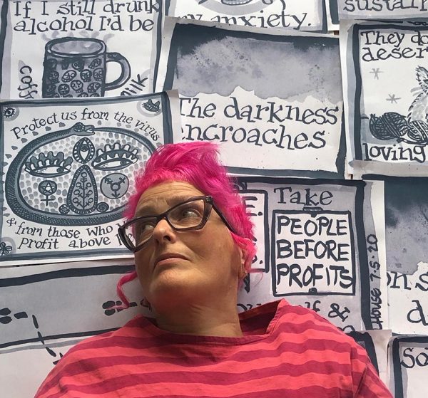Artist Rachael House with pink hair and pink stripy top