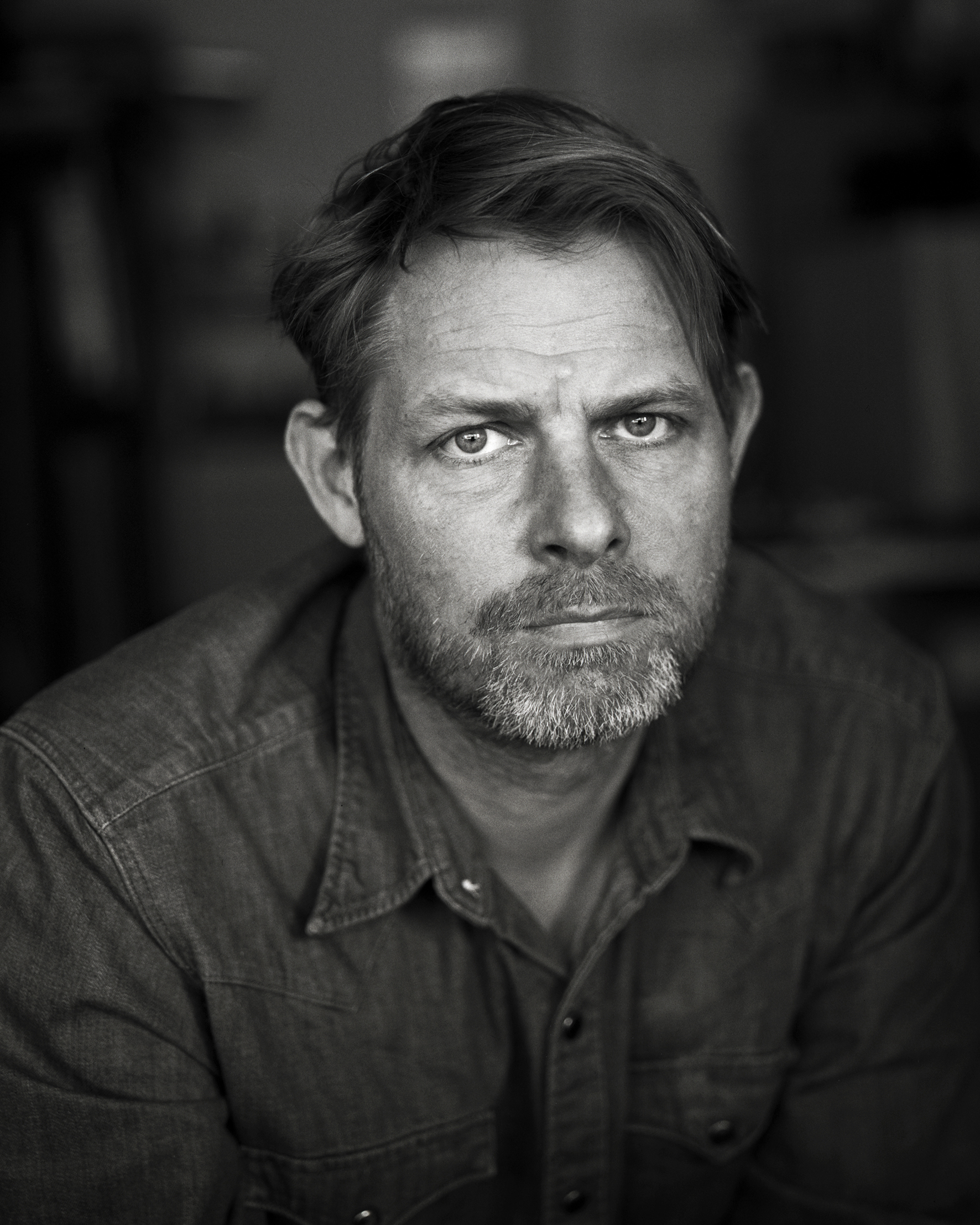 Black and white portrait photograph of Nikolaj Bendix Skyum Larsen
